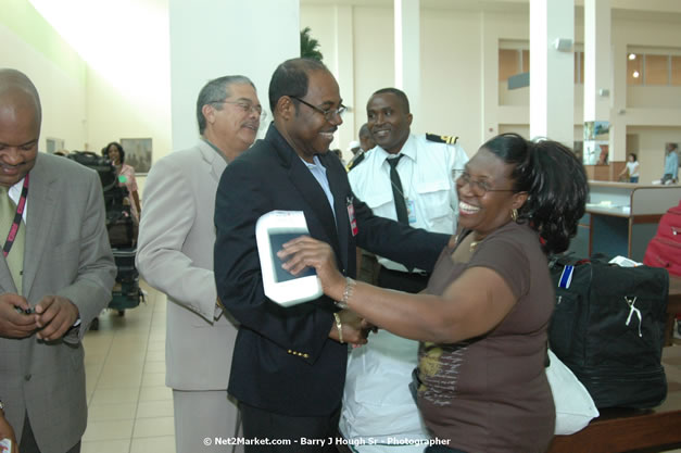 Minister of Tourism, Hon. Edmund Bartlett - Director of Tourism, Basil Smith, and Mayor of Montego Bay, Councillor Charles Sinclair Launch of Winter Tourism Season at Sangster International Airport, Saturday, December 15, 2007 - Sangster International Airport - MBJ Airports Limited, Montego Bay, Jamaica W.I. - Photographs by Net2Market.com - Barry J. Hough Sr, Photographer - Negril Travel Guide, Negril Jamaica WI - http://www.negriltravelguide.com - info@negriltravelguide.com...!