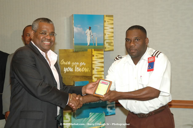 Red Cap Porters Awards - Minister of Tourism, Hon. Edmund Bartlett - Director of Tourism, Basil Smith - Friday, December 14, 2007 - Holiday Inn Sunspree, Montego Bay, Jamaica W.I. - Photographs by Net2Market.com - Barry J. Hough Sr, Photographer - Negril Travel Guide, Negril Jamaica WI - http://www.negriltravelguide.com - info@negriltravelguide.com...!